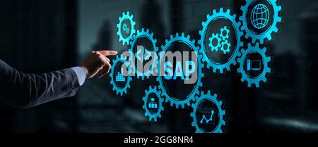 SAP System Software Automation concept. Businessman presses virtual button SAP. Stock Photo