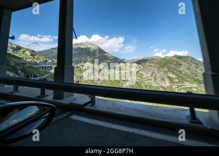 The old road of St. Gotthard pass seen from the tunnel near Airolo, Switzerland, Alps Stock Photo