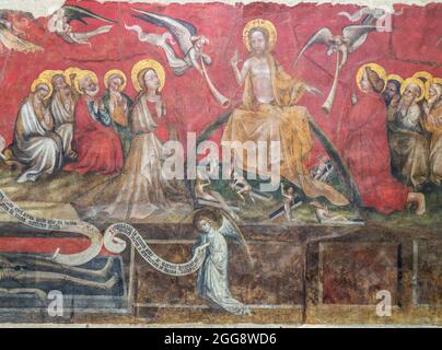 Fresco, Christ accompanied by the Virgin and saints, church, Ennezat, Puy-de-Dôme, Auvergne-Rhône-Alpes, France. Stock Photo