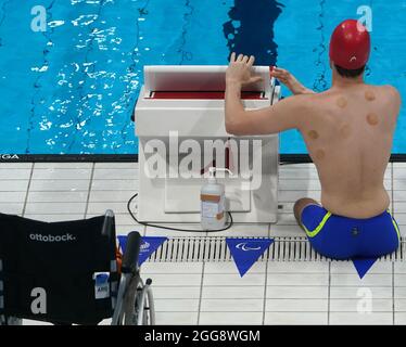 Tokio, Japan. 30th Aug, 2021. Paralympics: Para swimming, men, 50m butterfly, at Tokyo Aquatics Centre. Matias de Andrade (Argentina). Credit: Marcus Brandt/dpa/Alamy Live News Stock Photo