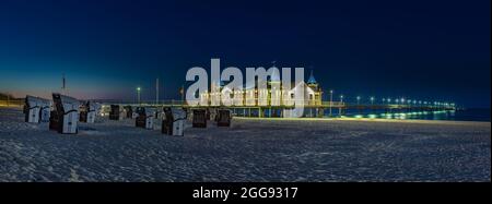 The Pier of Ahlbeck at the Baltic Coast (Island Usedom, Germany) in dusk light - panoramic view Stock Photo