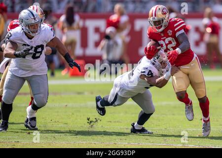 Santa Clara, United States. 29th Aug, 2021. San Francisco 49ers wide  receiver Deebo Samuel (19) is tackled by Las Vegas Raiders free safety Karl  Joseph (43) and linebacker Max Richardson (54) during