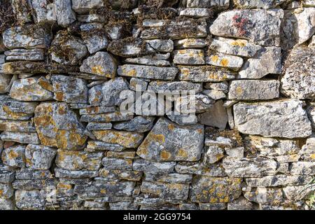 Old stonewall for background or texture Stock Photo