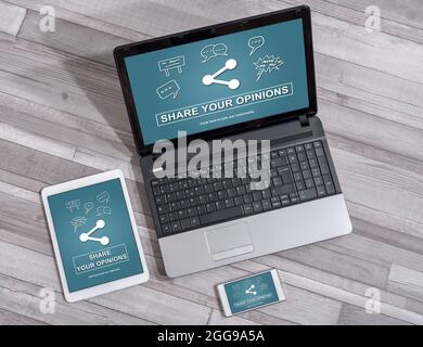 Opinions sharing concept shown on different information technology devices Stock Photo