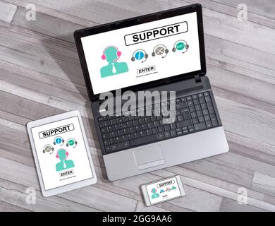 Support concept shown on different information technology devices Stock Photo