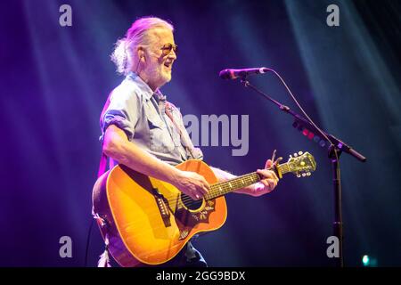 Toronto, Canada. 28th Aug, 2021. Greg Keelor, lead guitarist of the Canadian country rock band BLUE RODEO performing at a 'Sold Out Show' at the Budweiser Stage in Toronto, Canada. Credit: SOPA Images Limited/Alamy Live News Stock Photo