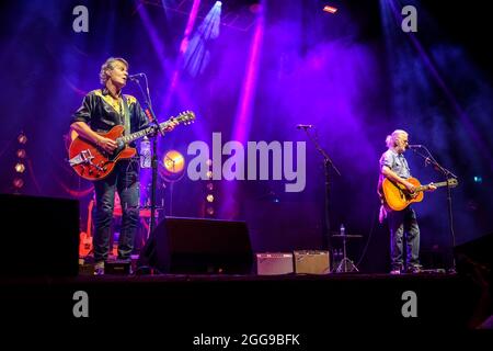 Toronto, Canada. 28th Aug, 2021. Jim Cuddy lead singer and Greg Keelor lead guitarist of the Canadian country rock band BLUE RODEO and lead guitarist Greg Keelor performing at a 'Sold Out Show' at the Budweiser Stage in Toronto, Canada. Credit: SOPA Images Limited/Alamy Live News Stock Photo
