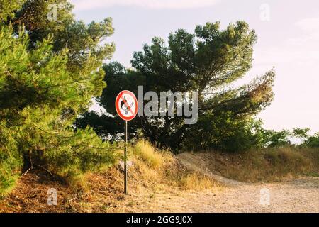 Prohibition sign prohibiting the open fire in a wooded camping area Stock Photo