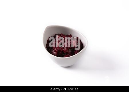 Beetroot sauce in white bowl isolated on white background Stock Photo