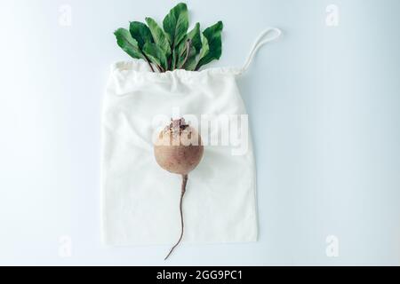 Red beets on a white background. creative concept of eco friendly bags and save the world from plastic waste. High quality photo Stock Photo