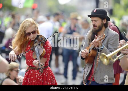 London, England, UK. Musician playing at an Extinction Rebellion protest in Whitehall, 24th August 2021 Stock Photo