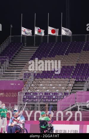 Tokyo. 30th Aug, 2021. Photo taken on Aug. 30, 2021 shows the flags are flown at half-mast as remembrance and honour to the late former International Olympic Committee President Jacques Rogge in the Yumenoshima Archery Field in Tokyo, Japan. Credit: Du Xiaoyi/Xinhua/Alamy Live News Stock Photo