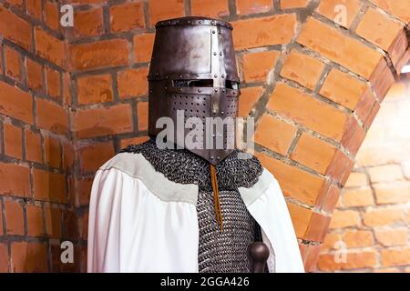 Old historical medieval iron knight armor for ancient warriors protection in combat. Traditional past fighter heavy metal defense equipment in battle Stock Photo