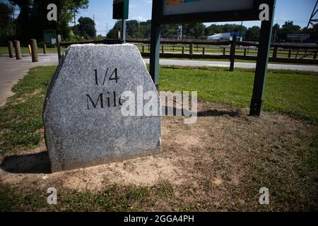 Sign showing a milestone on the one mile trail Stock Photo