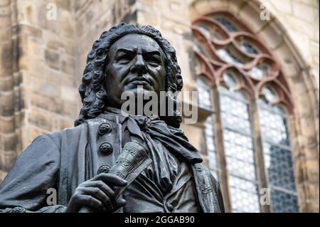 Monument to the Thomaskantor and composer Johann Sebastian Bach in front of the Thomaskirche in Leipzig Stock Photo