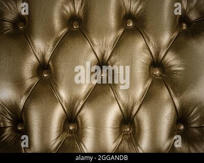 Retro styled image of an old vintage couch with buttons Stock Photo