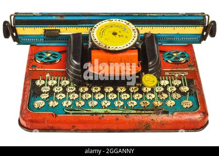 Colorful vintage toy typewriter isolated on a white background Stock Photo