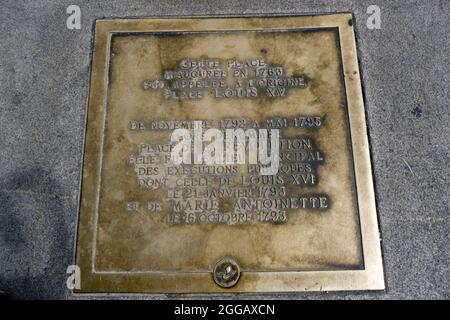 Plaque denoting Louis XVI and Marie Antoinette execution for treason at the base of the Obelisk in the Place de la Concorde Paris France Stock Photo