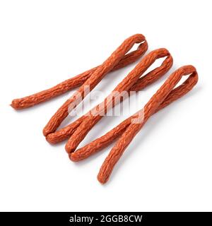 Whole smoked polish cabanossi sausages isolated on white background Stock Photo