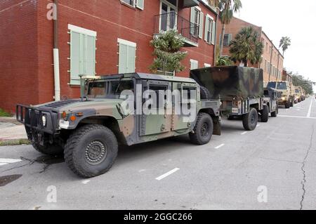 New Orleans, United States. 30th Aug, 2021. Vehicles from the Louisiana National Guard line Rampart St on the edge of the French Quarter as they wait for orders as to where they will deploy after Hurricane Ida slammed New Orleans, Monday, August 30, 2021. Photo by AJ Sisco/UPI Credit: UPI/Alamy Live News Stock Photo