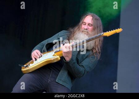 Portsmouth, UK. 29th Aug, 2021. Liam Sean 'Skin' Tyson, lead guitarist with English Indie alternative rock band Cast performs live on stage at Victorious Festival in Portsmouth. Credit: SOPA Images Limited/Alamy Live News Stock Photo