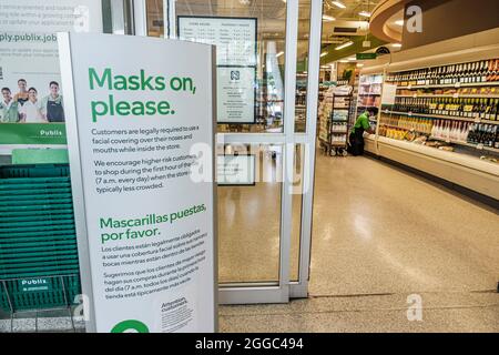 Miami Beach Florida,Publix grocery store supermarket entrance sign notice Spanish English,wear mask masks Covid-19 health crisis pandemic coronavirus
