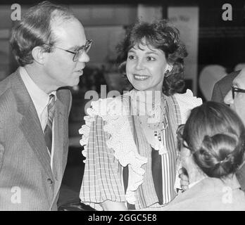 Austin Texas USA, circa 1986: David Eisenhower, grandson of former U.S. Pres, Dwight D. Eisenhower, and his wife, Julie Nixon Eisenhower, daughter of former U.S. Pres. Richard M. Nixon, chat with guests at an event. ©Bob Daemmrich Stock Photo