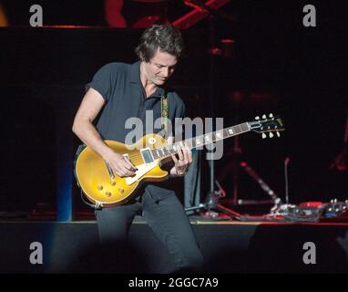 August 10, 2021 - Wilmington, North Carolina; USA - Guitarist of the band  TRAIN  performs live as their 2021 tour makes a stop at the Live Oak Bank Pavilion at Riverfront Park located in Wilmington. Copyright 2021 Jason Moore. (Credit Image: © Jason Moore/ZUMA Press Wire) Stock Photo