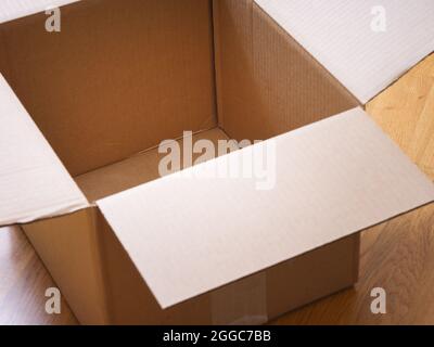 An open cardboard box. Close up. Stock Photo
