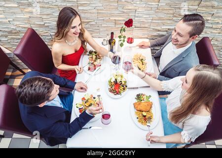 family eating at fancy restaurant