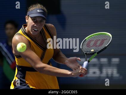 Flushing Meadow, United States. 30th Aug, 2021. Madison Keys returns a ball to Sloane Stephens before losing in straight sets in Arthur Ashe Stadium in the first round of the 2021 US Open Tennis Championships at the USTA Billie Jean King National Tennis Center on Monday, August 30, 2021 in New York City. Photo by John Angelillo/UPI Credit: UPI/Alamy Live News Stock Photo