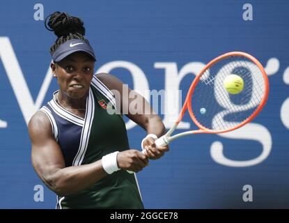 Flushing Meadow, United States. 30th Aug, 2021. Sloane Stephens returns a ball in the second set before defeating Madison Keys in straight sets in Arthur Ashe Stadium in the first round of the 2021 US Open Tennis Championships at the USTA Billie Jean King National Tennis Center on Monday, August 30, 2021 in New York City. Photo by John Angelillo/UPI Credit: UPI/Alamy Live News Stock Photo