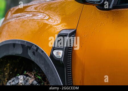 MOSCOW, RUSSIA - MAY 08, 2021 Renault Duster second generation details view. Exterior close up view of modern turn signal with raindrops. Stock Photo