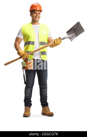 Full length portrait of a construction worker holding a shovel isolated on  white background Stock Photo - Alamy