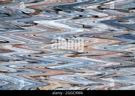 Abstract background of multi-colored horizontal zigzags. Top view. Stock Photo
