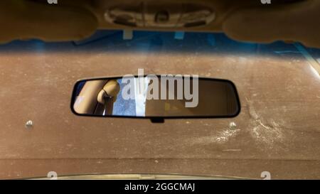 A Rear View Mirror in a Vehicle Stock Photo