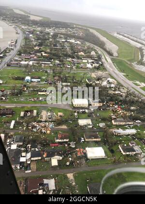 Galliano, United States Of America. 30th Aug, 2021. Aerial photo showing the aftermath of Hurricane Ida along the Gulf Coast August 30, 2021 in Galliano, Louisiana. Ida is packing winds of 150 mph made landfall 16-years ago to the day of Hurricane Katrina. The Coast Guard conducts Hurricane Ida post-storm overflights along the Gulf Coast on August 30, 2020. Aircrews conducted overflights near, LA to assess damage and identify hazards. (U.S. Coast Guard courtesy photo) Credit: US Coast Guard/Alamy Live News