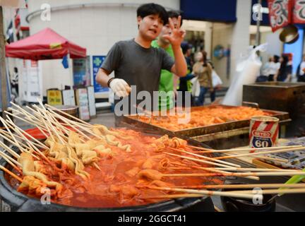 Street food vendors at the popular shopping district of Myeongdong, Seoul, South Korea. Stock Photo