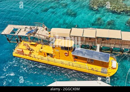 Yellow submarine boat for underwater excursions in the Red Sea Stock Photo