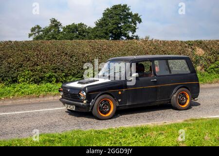 1972 70s seventies custom Reliant Rebel 700 fitted with Mazda-Mx5 engine, en-route to Capesthorne Hall classic August car show, Cheshire, UK Stock Photo