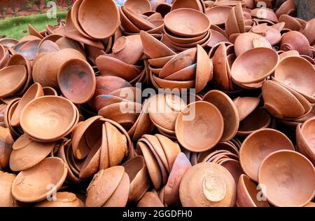 Close up of heap of Indian clay oil lanterns or diya ready to be sold in market during Diwali in India Stock Photo