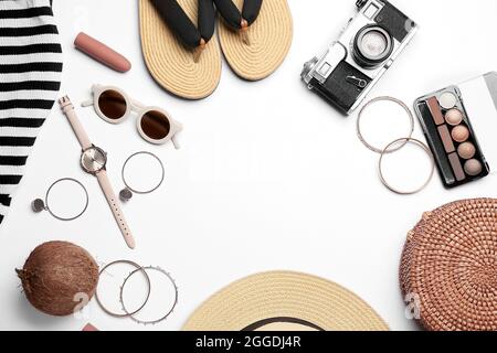 Frame made of female accessories and cosmetics on white background Stock Photo
