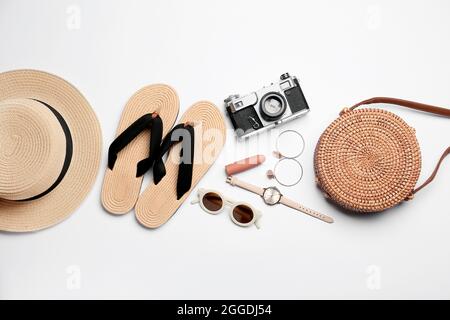 Set of female accessories, cosmetics and photo camera on white background Stock Photo