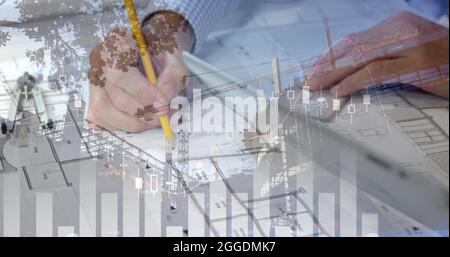 Different graphs, hands drawing and holding a tablet, and a building in construction Stock Photo