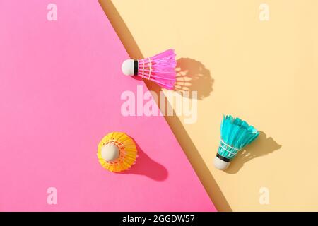 Badminton shuttlecocks on color background Stock Photo