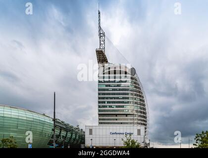 Bremerhaven, Germany - August 6 2019: Klimahaus museum, Conference Center and Atlantic Hotel Sail City a stormy day of summer Stock Photo