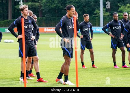 ZEIST, NETHERLANDS - AUGUST 31: Wout Weghorst of the Netherlands, Virgil van Dijk of the Netherlands during the Netherlands Training Session  at KNVB Campus on August 31, 2021 in Zeist, Netherlands (Photo by Jeroen Meuwsen/Orange Pictures) Stock Photo