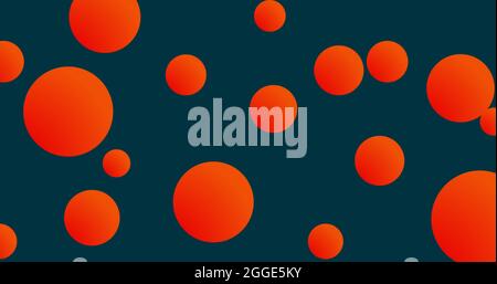 Multiple orange spheres moving against blue background Stock Photo