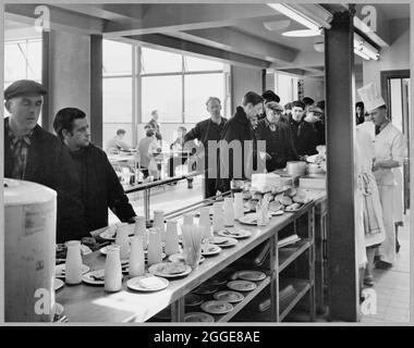 Construction workers in cafeteria Stock Photo - Alamy