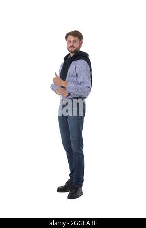 Full length portrait of young man showing thumb up isolated on white background Stock Photo
